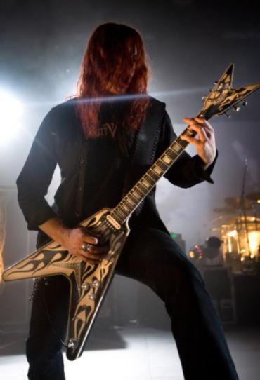 Michael Amott with his own signature Dean guitar