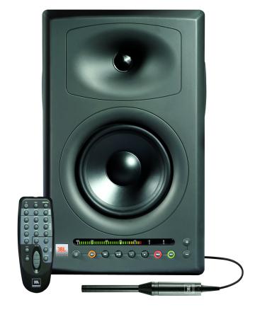  JBL LSR4328P Studio Monitor shown with calibration microphone and Wireless Remote Control